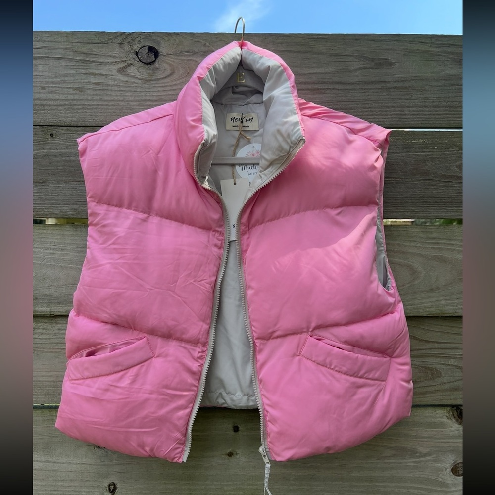 New In pink Puffer vest.  NWT